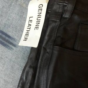 Leather pants.